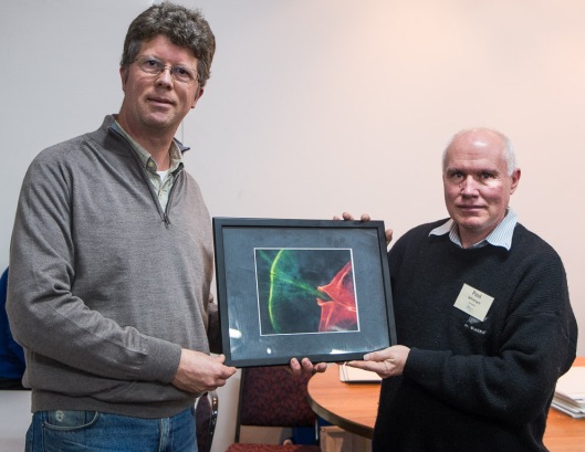 Phit Dyer, President of the Wellington Photography Society, presenting the Stella Daniel print to Paul Whitham, President of the Hutt Camera Club (on behalf of Ian Watkins)